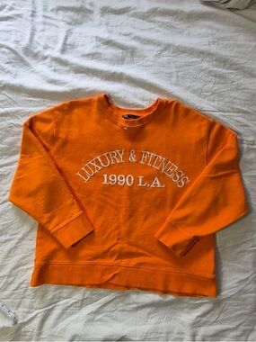 Zara Orange Crewneck Sweater with White 'Luxury & Fitness 1990 L.A.' Embroidery